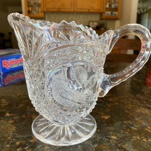 Vintage Crystal pitcher with etched bird possibly milk pitcher .